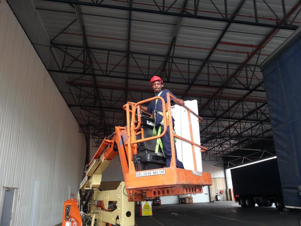 Up we go to finish installing bird netting at an international company in Isando