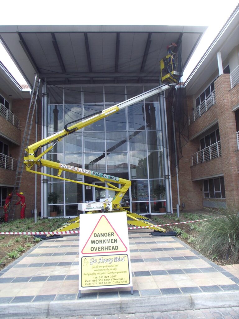 Using a cherry picker at an international company head office in Woodmead